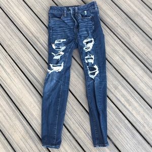 Dark blue ripped skinny jeans